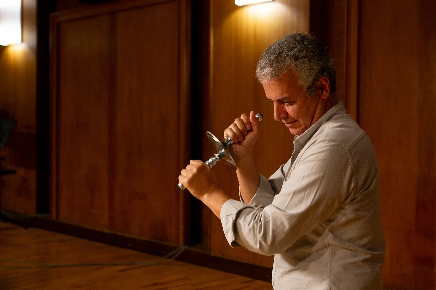 Percussionist playing handheld cymbals at Vienna Synchron Stage